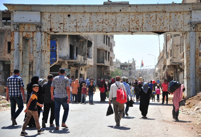 战后满目疮痍学校墙上弹痕累累叙利亚的孩子们在这里上课